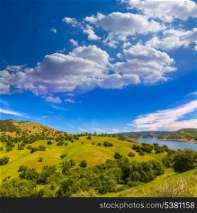 California meadows hill and lake in a blue sky spring day USA