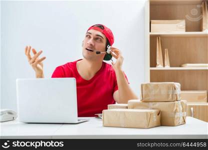 Call center worker at parcel distribution center in post office