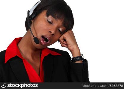 Call-center worker yawning