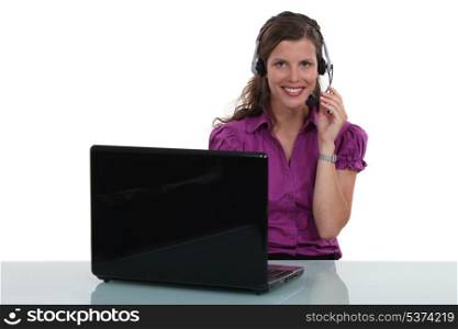 Call centre agent at her desk