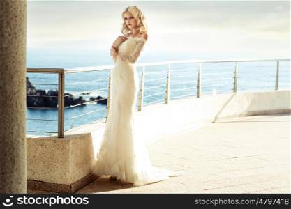 Calm blond bride waiting for her beloved husband