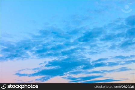 Calm evening sky with clouds, may be used as background