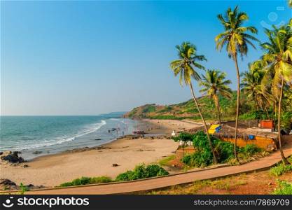 calm ocean and sandy beach in Goa