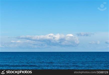 Calm Sea and Blue Sky Background.