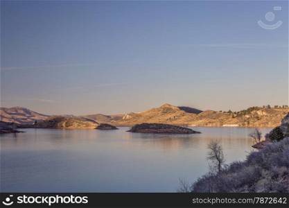 calm winter sunset over Horsetooth Reservoir near Fort Collins in northern Colorado