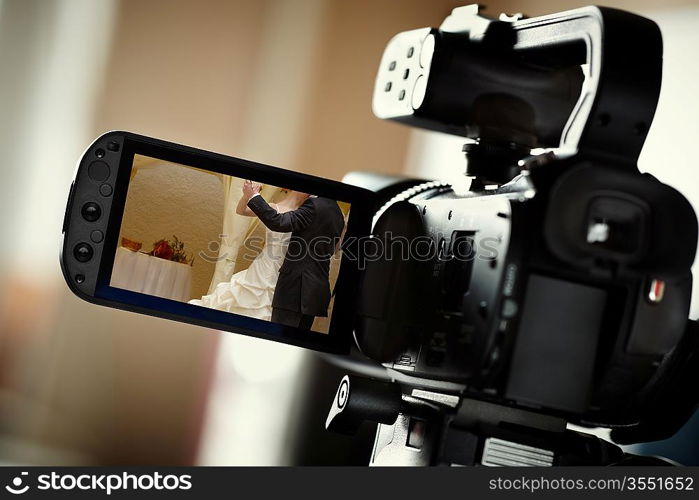 camcorder, selective focus on screen, wedding dance photo made by me