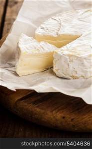 camembert cheese slice macro shot. Shallow DOF