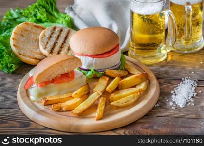 Camembert Hamburgers on the wooden background