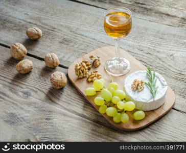 Camembert with walnuts and grape