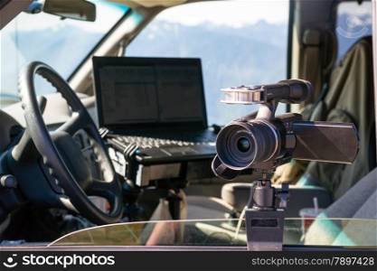 Camera and Laptop mounted on van window