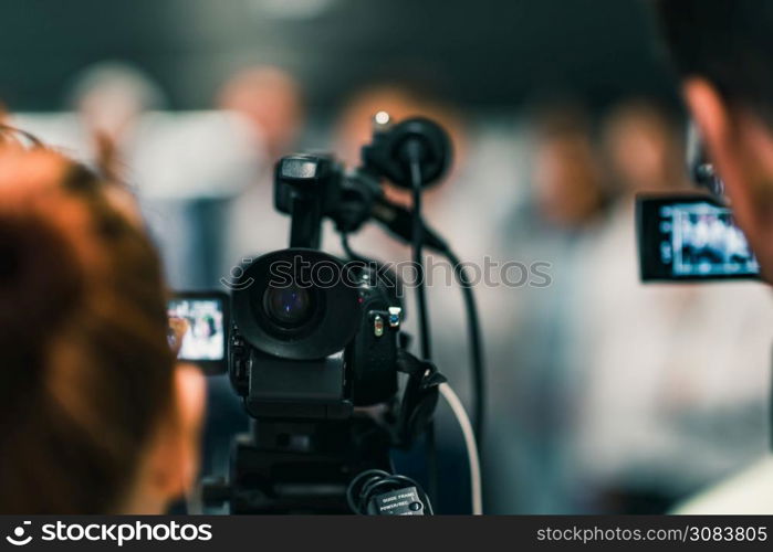 Camera at media conference