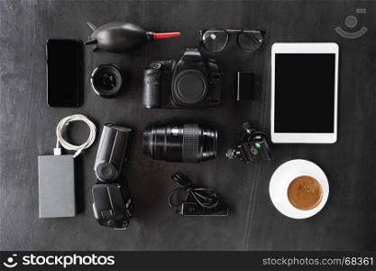camera gear device set on dark background