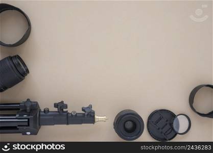 camera lens camera accessories arranged colored background