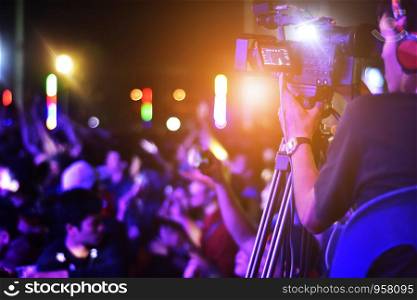 Camera man in live concert,Photographer video shooting in Concert