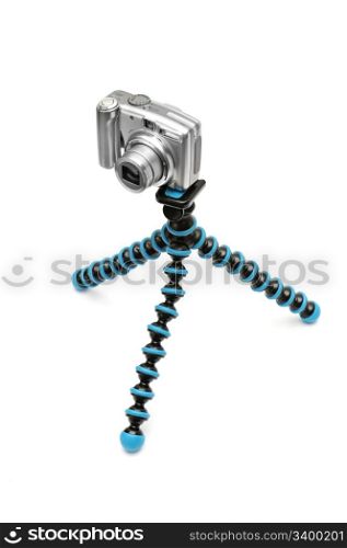 Camera on a tripod isolated on a white background.
