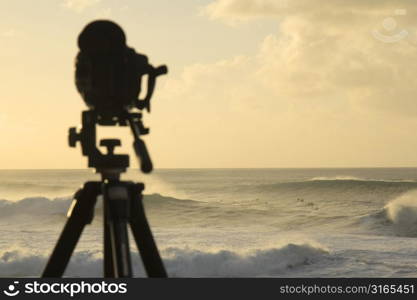 Camera on Tripod with Ocean