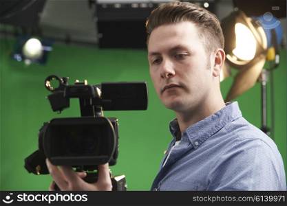 Cameraman Working In Television Studio