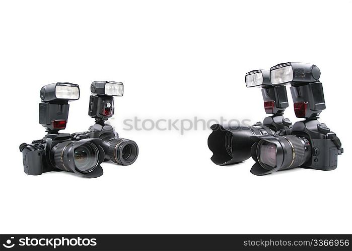 Cameras with flashes on white background