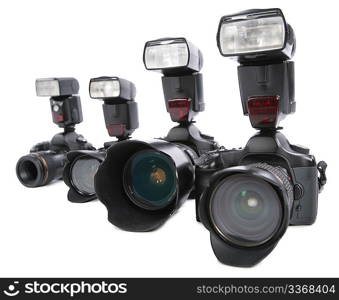 Cameras with flashes on white background in a row