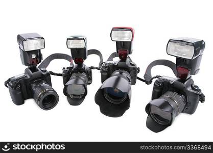 Cameras with flashes on white background in half circle