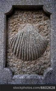Camino Santiago stone shell sign in Combarro Way of Saint James at Galicia Spain