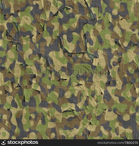 camouflage material. image of old flaking and peeling camouflage material