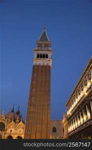 Campanile in Piazza San Marco at dusk in Venice, Italy.
