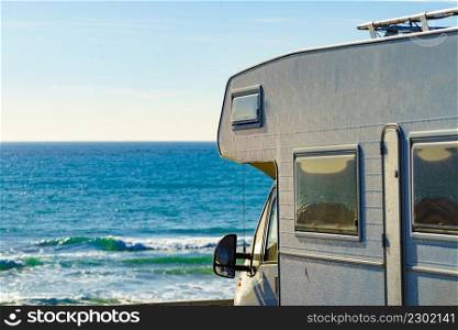Camper rv camping on beach sea shore. Caravan vacation.. Caravan camping on sea shore, Spain