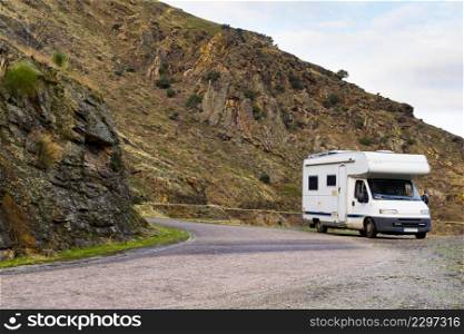 Camper rv camping on nature. Holidays and traveling with motor home.. Camper rv camping on mountain nature