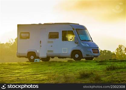 Camper vehicle camping on nature. Travel in wintertime.. Camper rv camping on nature.
