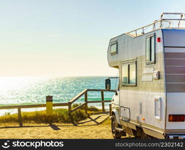 Camper vehicle rv camping on beach sea shore. Spain Murcia region, Calblanque Regional Park.. Camper rv camping on sea shore, Spain