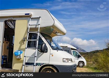 Camping on nature. Camper vehicle with portable ladder. Caravanning equipment, must have tool, maintain rv. Holiday trip with motor home.. Caravan with ladder. Camper equipment.