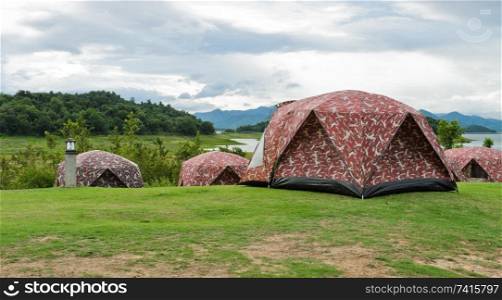 Camping tents by Lake