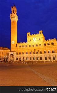 Campo Square and Mangia Tower in Siena at night, Italy