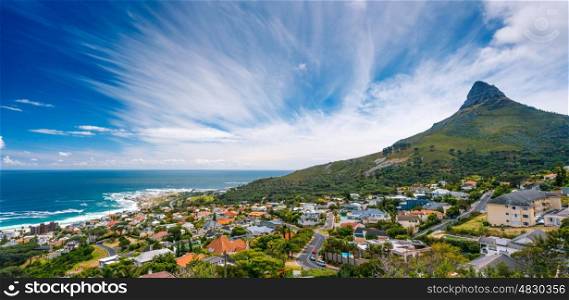 Camps Bay and Lion's Head mountain, amazing panoramic landscape of a coastal city, part of a Table Mountain National Park, Cape Town, South Africa&#xA;