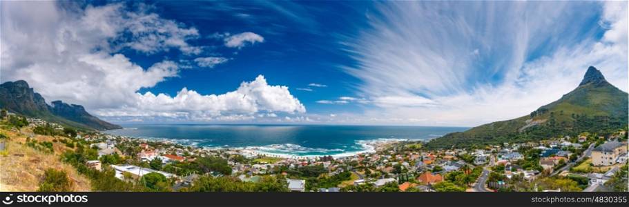 Camps Bay and Lion's Head mountain, amazing panoramic landscape of coastal city between two mountains, Cape Town, South Africa&#xA;