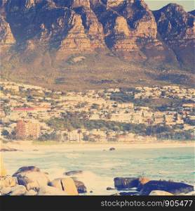 Camps Bay in Cape Town at Sunset with retro Instagram style filter effect