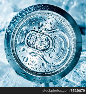 Can of soft drink on ice.