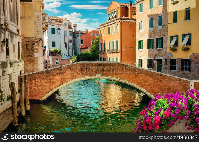 Canal and bridge in Venice at sunset