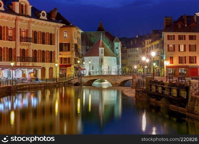 Canal and facades of medieval houses in the old city on the sunset. Annecy. France.. Annecy. Old city on the sunset.