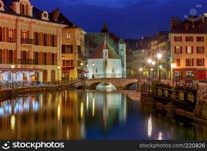 Canal and facades of medieval houses in the old city on the sunset. Annecy. France.. Annecy. Old city on the sunset.