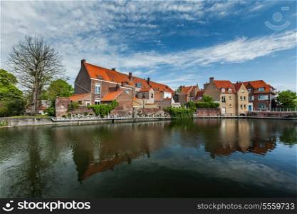 Canal and medieval houses. Bruges (Brugge), Belgium