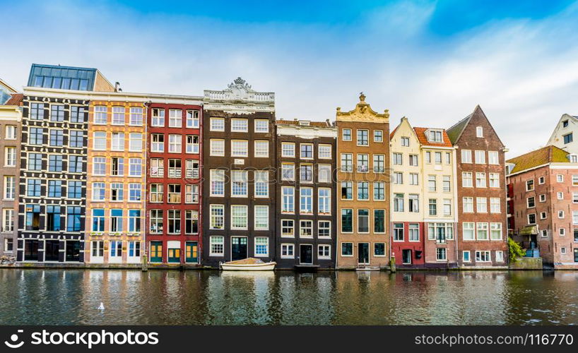 Canal houses of Amsterdam, Netherlands. Traditional old buildings in Amsterdam