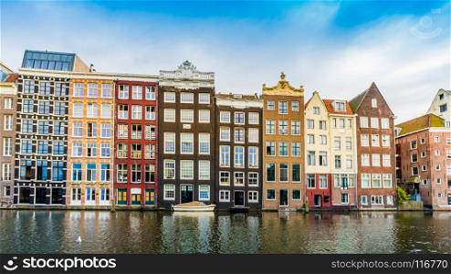 Canal houses of Amsterdam, Netherlands. Traditional old buildings in Amsterdam