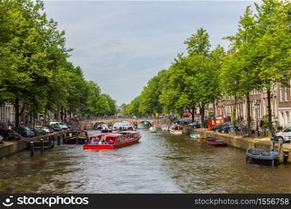 Canal in Amsterdam in a beautiful summer day. Amsterdam is the capital and the most populous city of the Netherlands
