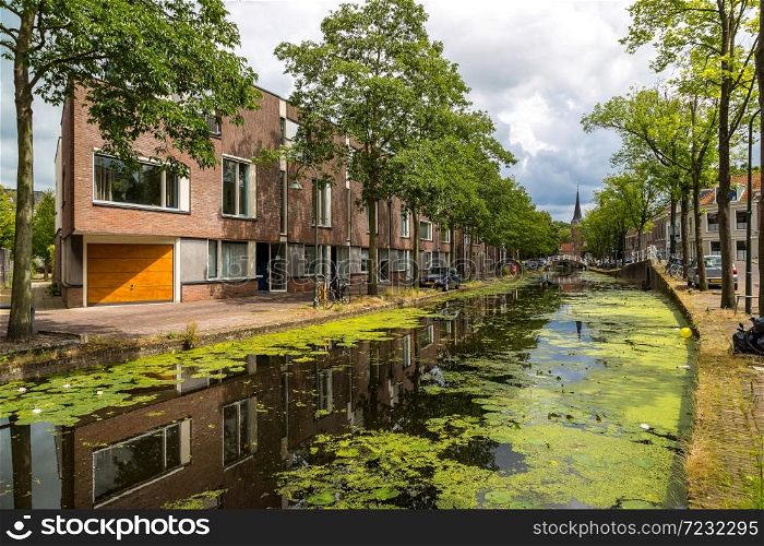 Canal in historical part of Delft in a beautiful summer day, The Netherlands