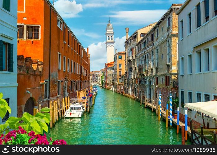 Canal in Venice between the old houses