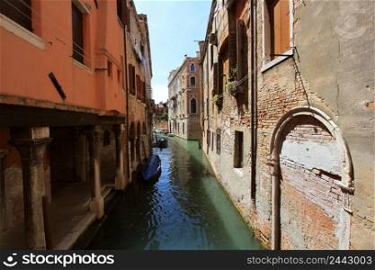 Canal in Venice, Italy. Exquisite antique buildings along Canals.. Canal in Venice, Italy. Exquisite buildings along Canals.