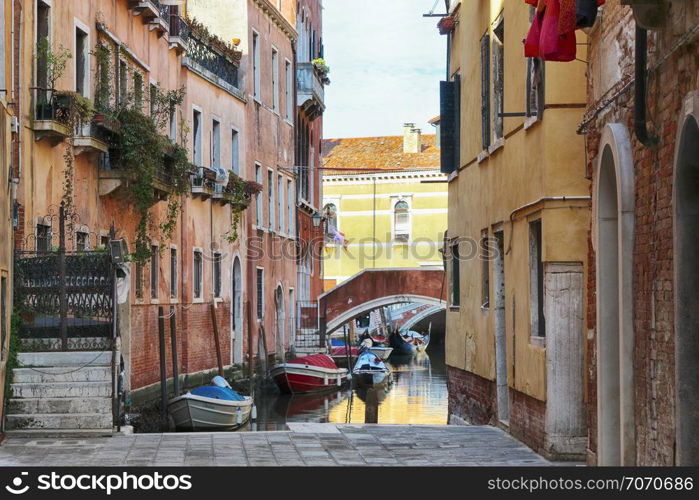 canal of Italy with boat. Venice