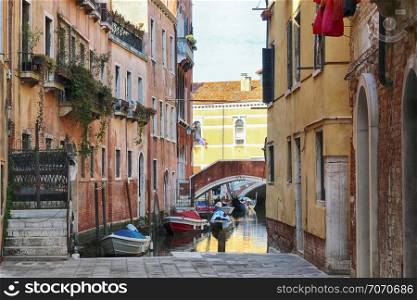 canal of Italy with boat. Venice
